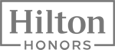 The image shows the Hilton Honors logo, featuring the word "Hilton" above "Honors" within a rectangular outline.