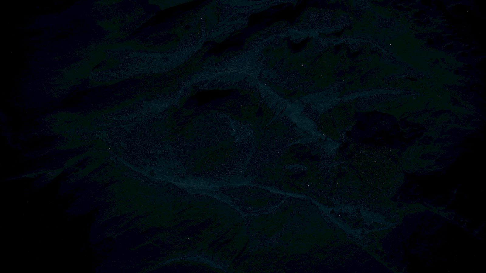 The image appears very dark with minimal visible detail, making it difficult to determine specific content.