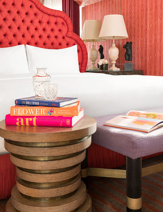 room with books on side table